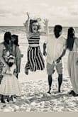 This was perfect for beach pictures.  Only con is it is a little long in length. The top ties so it fits well. So many compliments.  Highly recommend.  The photo shows my family thought it was funny "to all jump on three" - Marci H.
