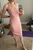 Ugh I wish I could rock this dress! It fits great and has a great style but it shows ALL of your body. You'll see in the photo I posted you can see my hip bones, my tummy, my underwear line. It fits exactly like a glove with no room for error... The zipper also had an issue, before I tried it on, and would get stuck so it is not easy to put on without help! - MacKenzie C.