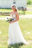I was terrified to order my wedding dress online but just couldn't bear to spend so much on a dress I'd wear only once. I chatted online to determine the best fit and the size 2 was perfect. I have never felt so beautiful and I got so many compliments on the dress. No one could believe I ordered it online or the price! So worth it and zero regrets in buying this dress. - Caroline L.