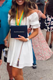 The dress fit a little loose around the waist but I would not change the size. Super cute! You can scrunch the sleeves and wear it off the shoulders too. - Brenna S.