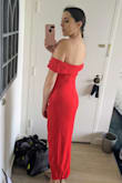 This is exactly what I wanted this dress to be. Gonna wear for my bachelorette party and I can't wait. The ruching in the front is so flattering so I can feel confident that I'll still look good even after a bunch of beers and a late night pizza. Fits as described, just gonna need to get it pressed so the bottom evens out a bit. This is such a "wow, look at me" dress! - Erin B.