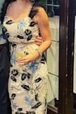 I received a ton of compliments on this dress! It looks the same as the photos. I love that the material is stretchy. I'm petite, and the straps were a little too long for me so I sewed them. It was an easy fix. - Jodi T.