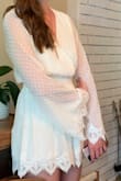 Got white for my rehearsal dinner And It was very comfortable! Flattering, not too tight, not see through. The button that holds the bust area together is a great touch. Sleeves are a really nice boho look and lace is nice quality. - GENNA M.