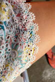 What I like about this piece is that is very unique and stylish. The shorts go a little above the belly button so that even if you have a bit to hide in that area you can still fill comfortable and rock it! It does not create a pouch when setting. The colors are great and so does the cut of the shorts. Highly recommend. You won't regret it as wherever you go will make a statement. - Asia M.