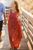 I wore this dress for my engagement photo shoot, and I was very happy with the results. It had the flowy, beachy look I was hoping for, and looked great during sunset. It was loose on me in the bust area so I used double stick fabric tape to secure it. - Alyssa C.