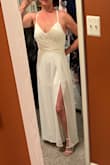 Bought this to celebrate our 25th anniversary. The bust was perfect with a strapless bra but I decided to take it in slightly and add cups to wear it without a bra. I also hemmed the length about 3.5 inches because I'm only 5 feet tall. Absolutely love it! It flows when you walk showing off your legs and shoes! - Robin B.