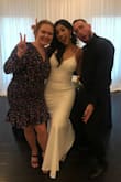 I had a reception over a year after the ceremony and getting married and didn't want to go through the hassle of wearing my wedding dress again. This dress exceeded my expectations. I didn't need any alterations and the fabric was stretchy and hugged my body perfectly. I definitely recommend spanx with this dress since it's white and can smooth you out. - Brittany B.