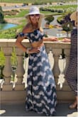 This was such a hit on my girls trip to Napa! Will definitely be taking it on my upcoming trip to the beach in Florida as well. Not only is it feminine and has a beautiful flow to it, it is also as comfortable as wearing pajamas! I ordered the small and it fit perfectly. People mentioned that the top does run a little bit small and I agree but it's stretchy so it still felt just right. Get this! - Heather G.