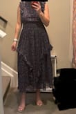 I love this dress so much. The design, the print and the fit are are beautiful. The dress is a bit heavier as other reviews on here mentioned. There's just a lot going on with the dress that is making me think it doesn't look good on me. The length hits just above my ankles so I think I can pull it off. - Lindsay K.