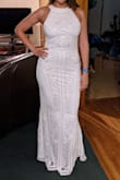 This dress is gorgeous and the fabric is good quality but it wouldn't hug my body as much as I hoped and the back, especially in the zipper area fit a bit weird with the zipper kinda pupping out. - Tarlan C.