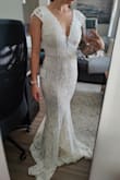 Absolutely love this dress for my big day! I like that it looks beautiful but isn't extremely heavy with details. I am gonna have my seamstress hem it and add pads because my chest runs a lil small (34 B) other than that everything about this dress is great. It's so comfortable and I'll definitely be able to wear it all day long without getting uncomfortable - Angela M.