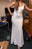 This dress is fine but not eye-catching by any means. The back fits weird, especially around the zipper area (as you can see in the picture). I wanted it for my small wedding but had to return it because I just didn't look good in it. - Tarlan C.