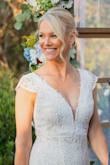 I love this dress!!!! The material on this dress is not too thick or too thin.-perfect for my small outdoor wedding. I am considered a mature bride-I wanted something classy and fitting but not too tight and this was the perfect dress. I first ordered the small, which I usually wear, but it was too big on top. I will be returning that one. I did a rush order for an extra small and received it in two days. Great job, Lulus! The extra small was perfect. I would recommend ordering a size smaller than you usually wear. - Karen P.