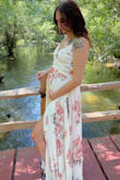 Absolutely stunning and beautiful, wore it to a friend's wedding . Fits perfectly even being 6 months pregnant! It's a little hard to figure out how to tie it and my only complaint is the little clasp that holds the bust part together.  It's such a cheap clasp it Absolutely would not stay clasped I had to get some Bobby pins to not flash anyone as I wore it without a bra. - Marilyn S.