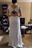 This dress was my top pic. Overall the design was stylish and the cutting made me look slimmer. I especially loved the shoulder part as it adds some blings into the dress. However, the dress was way too long for me. I believe they did it on purpose and expects you to go get it tailored. My tailor was more expensive than my dress because it has 3 layers. Overall loved it - Denise K.