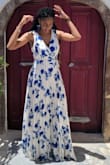 This dress is perfect! As a tall woman, at 5'9 without heels on this dress fell perfectly! I purchased a Med. Has a little weight but overall a light dress. 
This was my first purchase from Lulus but definitely not my last! - Adrienne C.