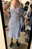 I wanted to keep this dress so bad, but I had to return it. The dress fit perfectly in the front, but the back paneling was too large. I could grab a handful of dress material in the back and still had extra room. I have an hourglass figure and thought this dress would work because of the way it goes in at the waist, but alas, it did not! Wish they had an XXS! - Tiffany L.