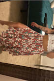 Fits perfectly and flows beautifully. It has three slits so which adds to the flow of the skirt. I can't wait to wear this out! - Moriah H.