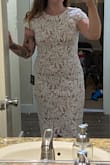 This dress had a little bit of wiggle room for me, in a good way! the sleeves were a little tight and the zipper was so hard to pull up and down, but it worked. I decided to go with another dress and I am sending this one back, but there was nothing wrong with it, just not exactly my style. - Bailey R.