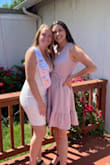 Really loved this dress for my bridal shower. It's very form fitting and hugs your curves. It's a little see through in the belly area and in some light, you can see your belly button or shape of it. It seemed as the more I wore this dress, the more it stretched, so I was pulling up my dress in the front chest area but then pulling down the back. Mixed feelings about it at the end of the day, but I am curvy so maybe that had more to do with it. - Allie F.
