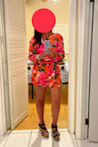I am not a fan of rompers but this is a must buy! I bought it for my Hawaiian vacation and I can't wait to wear it. The colors are stunning.
I am only 5'3' and I have to say, sitting down this romper went all the way up and it was uncomfortable to adjust and was very very short but standing up I had no issues. - Laura H.