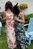 I ordered down a size - according to the chart, I should be a small. But it's all just ties, no zippers, so there's no risk in sizing down. It was perfect for my bridal shower. - Meghan H.