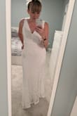 I tried on a dress very very similar to this in a big chain store. My friends all loved it. The price there was good, but the price on Lulus was better, and I personally think the fabric and structure are a little better as well. I am going to pretty this up with a sparkly belt and maybe an over skirt for my ceremony. I could have probably gone a size up, but I am hoping to a lose a few of the covid lbs before our big day. - Nicole L.
