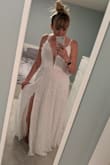 I could have sized down on this dress maybe, but it is so pretty, and so comfortable. It's long, but I love that, I am tall and have a hard time finding things that fit lengthwise. I may do an extra stitch up top to close the gap, maybe not.  I am going to wear this dress for photos in the mountains, I bought a different dress for the ceremony.  Either way, amazing and soooo worth the price. - Nicole L.