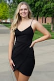 I bought this dress to wear for my college graduation pictures and absolutely loved it. It hugs your waist in the best way while not showing any tummy! Being a taller girl, the only "bad" thing I can say about this dress is that it does tend to ride up a bit while walking (nothing major) but other than that I LOVE this dress. Overall, it made me feel super confident! - Mikayla N.