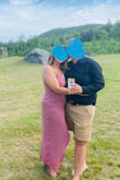 I ordered this dress in medium and large as I am usually between the two- the large fit perfectly (medium was a little tight, even though it fit). This dress is SO comfortable, light, and so unique with the longer length on one side. I wore it to an outdoor wedding, and it was perfect and I got tons of compliments! I can't wait to wear it again! - Becky F.