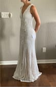 This is one of four Lulus dresses that I tried on for my upcoming elopement. This is hands down my favorite of the four, the fit is PERFECT and so comfortable! It is far more beautiful in person than it is in the stock photos! I have my search narrowed down between this one and one other Lulus dress. The other is much more casual than this one so I just need to decide how dressed up I want to be for our pictures. I'm certainly learning towards this one though. - Sierra T.
