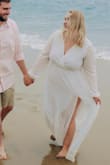 Waist was stretchy, very loose fit. Loved it. I'm a little bit bigger after giving birth and this was just the dress I needed to gain some confidence back. - Lauren M.