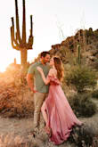 I loved this dress for my engagement photos!! Everyone said I looked like a desert princess. It was lightweight silky material and long enough to be super flowy in the wind. It does have a little clip to close up the chest area but it kept popping open with certain movements, so I'd size down and not worry about using that! Highly recommend! - Kelsey W.