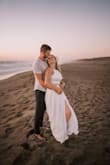 I was apprehensive to purchase this item based on reviews. I ordered it in a large and absolutely loved it! The skirt fit perfectly on my hips, and you can tighten or loosen the top with the back. I wore it for engagement photos and they turned out amazing! Couldn't see through the bottoms either. - Stephanie K.