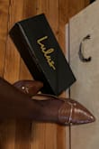I am normally a size 8.5 wide, I decided to get a size 9 which fits great, the color is jus as lovely. - Peris I.