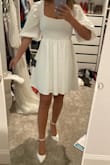 A little tight on the rib cage area, but not uncomfortable enough to not wear. I am petite so the dress was not short on me, but might be if you're taller. Soooo cute on! - Danielle G.