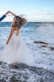Perfect dress for a beach wedding, very flowy and classy.  It looks expensive but the detail around the waist was falling out. Also I had to trim the length bc I'm only 5'3 and the dress was very long. Overall it was a perfect dress for the price you pay. It made me feel stunning. - Caroline M.