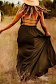 I used this dress for a photo shoot and it worked great! Flowy with just the right amount of leg peeping through. The back detail is unique and the material is nice. Great dress! - Nilly M.