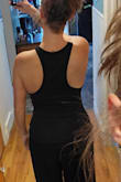 I really like the cut of this tank and the way it makes my all shoulders look good. I do wish it were longer. It's fine if you tuck it in but I feel like if I wanted it out it wouldn't be long enough to cover my mommy tum. Also, I have to use fashion tape to keep my bra from popping showing but I was prepared for that after seeing other reviews before I bought it. That being said, I'd still but it again. - Elizabeth B.