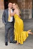 I wore this dress to a wedding and got so many compliments. The material is absolutely beautiful! I found that the dress ran a little big in the top area, but with the laces I was able to adjust it to fit just fine. - Holland P.