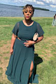 I absolutely love this dress!!!! The color is beautiful the size I purchased was a little loose but honestly it did not matter it was flowly and I love the split it's definitely a must buy. - Kyishonna B.