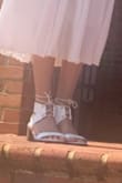 I got these to wear at my wedding. I usually have a hard time buying shoes since my right foot is about half a size bigger than my left, but these fit rather perfectly. In the picture I wrapped the laces around my ankle as I wanted smaller loops, and I think it turned out pretty good. :) - Christy S.