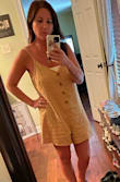 This is cute. But it's not fitted at the waist at all. I washed it and dried it hoping to shrink it a bit before I wore it. It did shrink a little. But not much. I wish it was a little more fitted at the waist. - Johnna A.