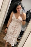 As soon as I put this dress on it fit like a glove! I'm a midsize woman so it's hard to find anything that holds me in the right places or just fits well in general. I'm so amazed by this dress I'm going to be wearing it for my backyard wedding I can't wait!! - Gloria F.