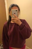 I usually don't go for colors like pink or purple but this one really is nice! The sweater is slightly cropped but covers just enough. Also super comfy. - Jessica Y.