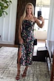 I absolutely loved this dress! I received multiple compliments on it! It fits a little loose on the hips but with the satin material I feel it's necessary since there isn't much give to it. - Haley R.