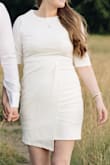 This dress arrived just in time for my engagement photo session and fit perfectly, it's exactly what I had in mind and hoped for. White clothes are often see-through, this dress is double layered so you don't have that problem. It's easy to slip on and instantly feel fancy, very comfortable too! - Stephanie G.
