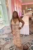 Loved this dress. I ordered an XL instead of a Large because of the bust size concerns. Dress was a little loose on me but over all loved it. Many compliments on the dress. - Adrianna P.