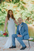 My husband and I planned a vow renewal for our 25th wedding anniversary. I knew that I wanted to wear a wedding dress and was so thankful that a friend recommended Lulu's. I tried on 6 different Lulu's dress and I always returned to this one. The lace was lightweight and soft, with just the perfect amount of stretch. I did not have it altered and kept the length, as I liked the train effect and the overall shape it gave. It hugs in all of the right places and made me feel beautiful. A perfect dress for a perfect day on a beach with my best friend. - Kari P.