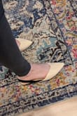 These are very cute! Received compliments. Love that they are fancy, but also flat so they won't cause back issues. Seem to be good quality. I usually wear 7.5 or 8 and these are pretty snug width-wise for size 8. There seems to be slight buckling near the right toe (small crease), so the material is not super flexible. Hoping they have good longevity for office use though. - Arynn P.
